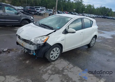 2014 Toyota Prius C One from USA, damaged, VIN JTDKDTB32E1566233